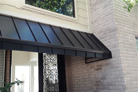 black metal awnings on a cream color house|25 Black awning ideas .